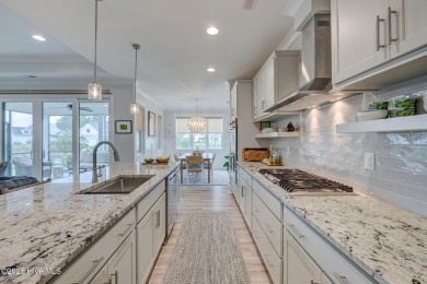 Built in 2022 in the sought-after Cape Fear National section of on Cape Fear National At Brunswick Forest in North Carolina - for sale on GolfHomes.com, golf home, golf lot