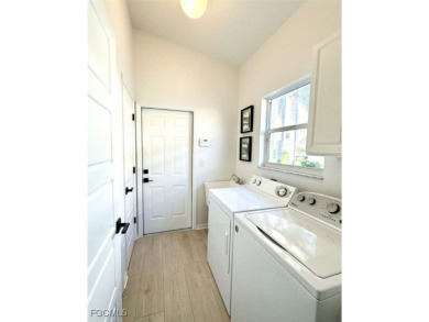 Welcome to 10001 Isola Way - A Stunning, Fully Renovated on  in Florida - for sale on GolfHomes.com, golf home, golf lot