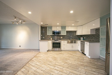 Overlooking a sparkling pool, this stylish open concept, N/S on Scottsdale Shadows in Arizona - for sale on GolfHomes.com, golf home, golf lot