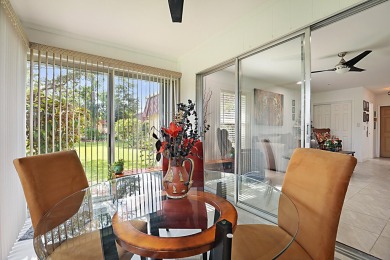 Open the door to this beautifully renovated 1/1.5 bath condo and on Poinciana Golf Club in Florida - for sale on GolfHomes.com, golf home, golf lot