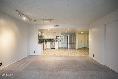 Overlooking a sparkling pool, this stylish open concept, N/S on Scottsdale Shadows in Arizona - for sale on GolfHomes.com, golf home, golf lot