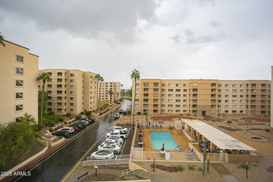 Overlooking a sparkling pool, this stylish open concept, N/S on Scottsdale Shadows in Arizona - for sale on GolfHomes.com, golf home, golf lot