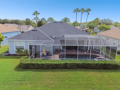 Under contract-accepting backup offers. Exquisite pool home on on Lexington Oaks Golf Club in Florida - for sale on GolfHomes.com, golf home, golf lot