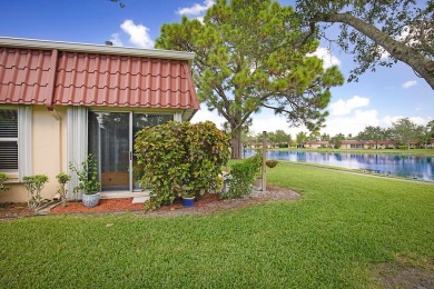 Open the door to this beautifully renovated 1/1.5 bath condo and on Poinciana Golf Club in Florida - for sale on GolfHomes.com, golf home, golf lot