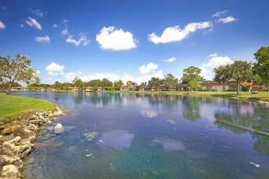 Open the door to this beautifully renovated 1/1.5 bath condo and on Poinciana Golf Club in Florida - for sale on GolfHomes.com, golf home, golf lot