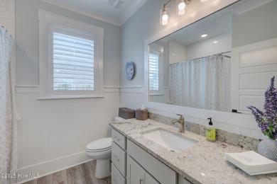 Built in 2022 in the sought-after Cape Fear National section of on Cape Fear National At Brunswick Forest in North Carolina - for sale on GolfHomes.com, golf home, golf lot