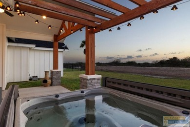SUNSETS FROM YOUR HOT TUB! Almost new, built 2023. Luxury on South Padre Island Golf Club in Texas - for sale on GolfHomes.com, golf home, golf lot