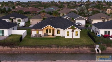 SUNSETS FROM YOUR HOT TUB! Almost new, built 2023. Luxury on South Padre Island Golf Club in Texas - for sale on GolfHomes.com, golf home, golf lot