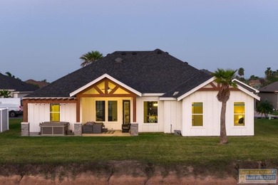 SUNSETS FROM YOUR HOT TUB! Almost new, built 2023. Luxury on South Padre Island Golf Club in Texas - for sale on GolfHomes.com, golf home, golf lot