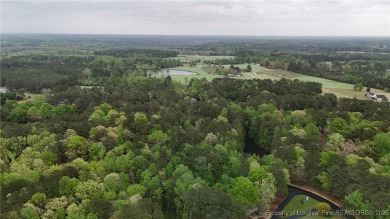 Located in the gated and highly coveted Carolina Trace, this on Carolina Trace Country Club in North Carolina - for sale on GolfHomes.com, golf home, golf lot