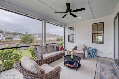 Built in 2022 in the sought-after Cape Fear National section of on Cape Fear National At Brunswick Forest in North Carolina - for sale on GolfHomes.com, golf home, golf lot