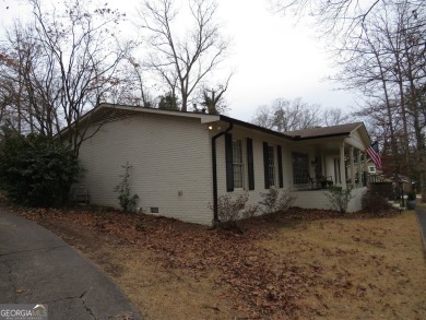 This sprawling brick ranch is in the perfect location! Minutes on Cherokee Golf and Country Club in Georgia - for sale on GolfHomes.com, golf home, golf lot