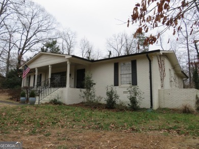 This sprawling brick ranch is in the perfect location! Minutes on Cherokee Golf and Country Club in Georgia - for sale on GolfHomes.com, golf home, golf lot