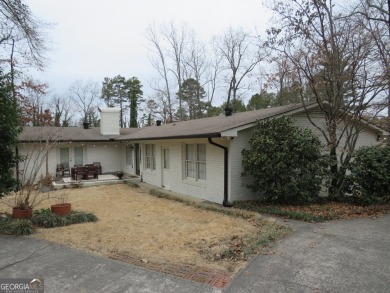 This sprawling brick ranch is in the perfect location! Minutes on Cherokee Golf and Country Club in Georgia - for sale on GolfHomes.com, golf home, golf lot