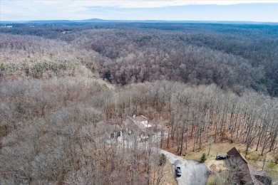 This home is partially completed and is selling as it currently on Sparta Golf and Country Club in Tennessee - for sale on GolfHomes.com, golf home, golf lot