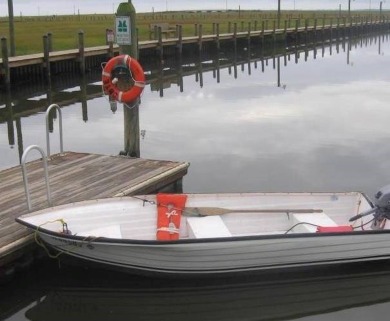 Lot with lots of extras.  Camper included is in great condition on Captains Cove Golf and Yacht Club in Virginia - for sale on GolfHomes.com, golf home, golf lot