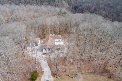 This home is partially completed and is selling as it currently on Sparta Golf and Country Club in Tennessee - for sale on GolfHomes.com, golf home, golf lot