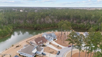 Experience luxury lakeside living in this beautifully appointed on Carolina Colours Golf Club in North Carolina - for sale on GolfHomes.com, golf home, golf lot