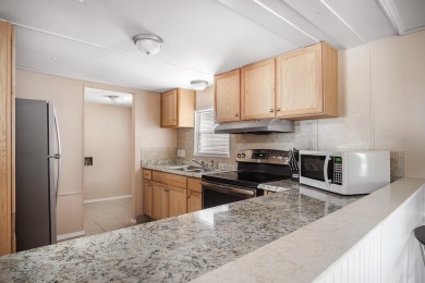 Check out this adorable cute and cozy, 3 Bedrooms 2 bath double on Brookridge Country Club in Florida - for sale on GolfHomes.com, golf home, golf lot