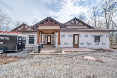 This home is partially completed and is selling as it currently on Sparta Golf and Country Club in Tennessee - for sale on GolfHomes.com, golf home, golf lot