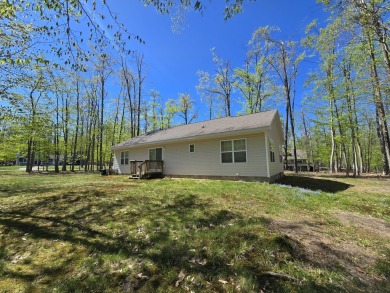 Your Forever Home or Perfect Up-North Oasis! Discover comfort on Michaywe Pines Course in Michigan - for sale on GolfHomes.com, golf home, golf lot