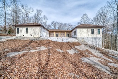 This home is partially completed and is selling as it currently on Sparta Golf and Country Club in Tennessee - for sale on GolfHomes.com, golf home, golf lot