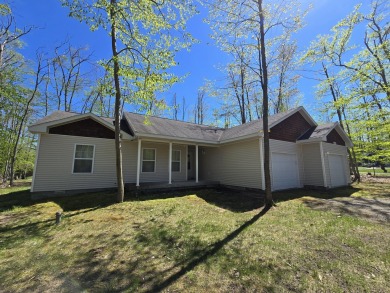 Your Forever Home or Perfect Up-North Oasis! Discover comfort on Michaywe Pines Course in Michigan - for sale on GolfHomes.com, golf home, golf lot