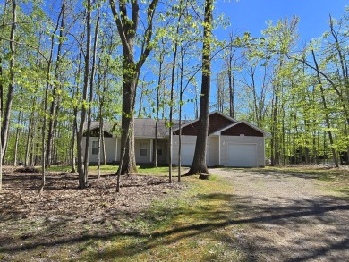 Your Forever Home or Perfect Up-North Oasis! Discover comfort on Michaywe Pines Course in Michigan - for sale on GolfHomes.com, golf home, golf lot