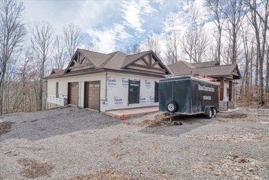 This home is partially completed and is selling as it currently on Sparta Golf and Country Club in Tennessee - for sale on GolfHomes.com, golf home, golf lot