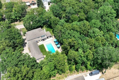 Elevate your style with Grand Beach Living - A Luxury Retreat on Grand Beach Municipal Golf Course in Michigan - for sale on GolfHomes.com, golf home, golf lot