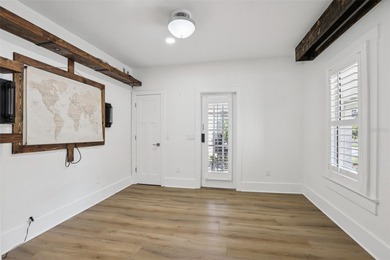 From the welcoming Key West-style front porch, step inside this on Belleair Country Club in Florida - for sale on GolfHomes.com, golf home, golf lot