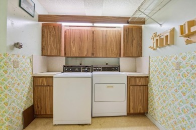 Ready for a remodel; Lovely golf course views from this spacious on Pine Island Ridge Country Club in Florida - for sale on GolfHomes.com, golf home, golf lot