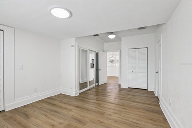 From the welcoming Key West-style front porch, step inside this on Belleair Country Club in Florida - for sale on GolfHomes.com, golf home, golf lot