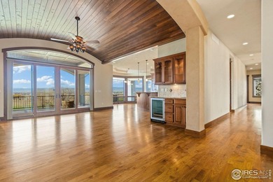 Exquisite Custom Home with Mountain and Golf Course on Harmony Golf Club in Colorado - for sale on GolfHomes.com, golf home, golf lot