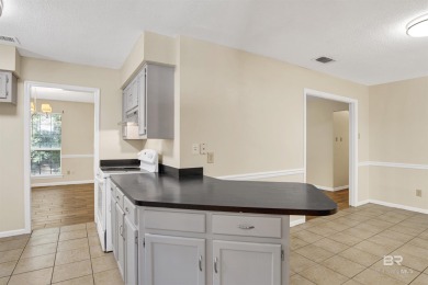 Welcome to 153 Worchester Drive, a charming single-story home on Lake Forest Yacht and Country Club in Alabama - for sale on GolfHomes.com, golf home, golf lot