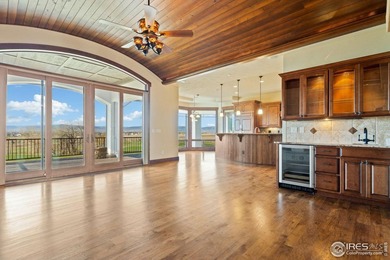 Exquisite Custom Home with Mountain and Golf Course on Harmony Golf Club in Colorado - for sale on GolfHomes.com, golf home, golf lot
