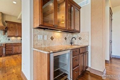 Exquisite Custom Home with Mountain and Golf Course on Harmony Golf Club in Colorado - for sale on GolfHomes.com, golf home, golf lot