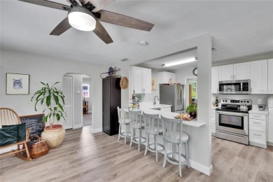 Welcome to this beautifully updated 3-bedroom, 2-bathroom on The Dunedin Country Club in Florida - for sale on GolfHomes.com, golf home, golf lot