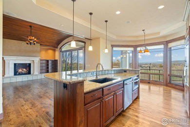 Exquisite Custom Home with Mountain and Golf Course on Harmony Golf Club in Colorado - for sale on GolfHomes.com, golf home, golf lot