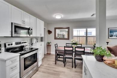 Welcome to this beautifully updated 3-bedroom, 2-bathroom on The Dunedin Country Club in Florida - for sale on GolfHomes.com, golf home, golf lot