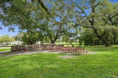 Ready for a remodel; Lovely golf course views from this spacious on Pine Island Ridge Country Club in Florida - for sale on GolfHomes.com, golf home, golf lot