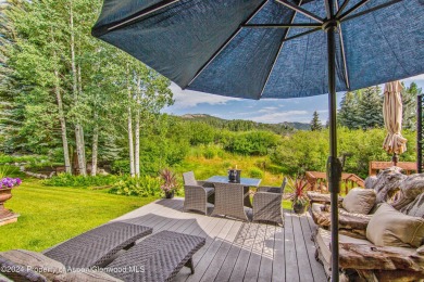 This Country Club Townhome enjoys privacy and a peaceful on The Snowmass Club in Colorado - for sale on GolfHomes.com, golf home, golf lot