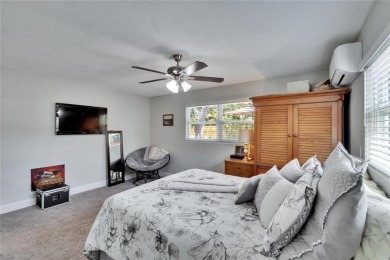 Welcome to this beautifully updated 3-bedroom, 2-bathroom on The Dunedin Country Club in Florida - for sale on GolfHomes.com, golf home, golf lot