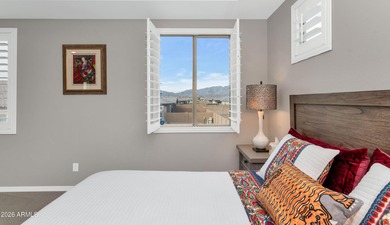 Enjoy panoramic mountain views and Phoenix skyline sunrises from on Verrado Golf Club  in Arizona - for sale on GolfHomes.com, golf home, golf lot