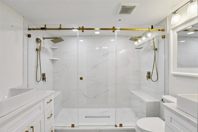 From the welcoming Key West-style front porch, step inside this on Belleair Country Club in Florida - for sale on GolfHomes.com, golf home, golf lot