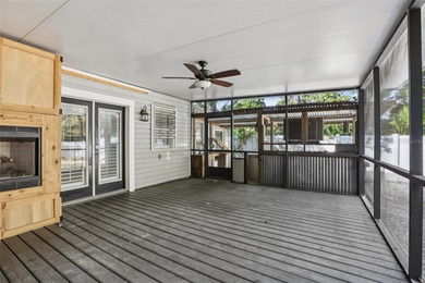 From the welcoming Key West-style front porch, step inside this on Belleair Country Club in Florida - for sale on GolfHomes.com, golf home, golf lot