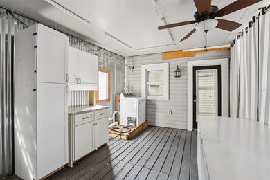 From the welcoming Key West-style front porch, step inside this on Belleair Country Club in Florida - for sale on GolfHomes.com, golf home, golf lot