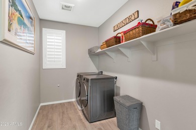 Enjoy panoramic mountain views and Phoenix skyline sunrises from on Verrado Golf Club  in Arizona - for sale on GolfHomes.com, golf home, golf lot