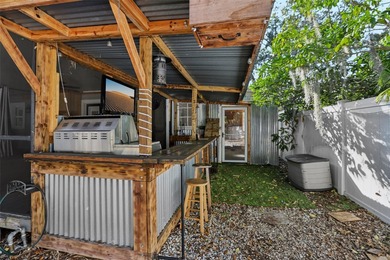 From the welcoming Key West-style front porch, step inside this on Belleair Country Club in Florida - for sale on GolfHomes.com, golf home, golf lot
