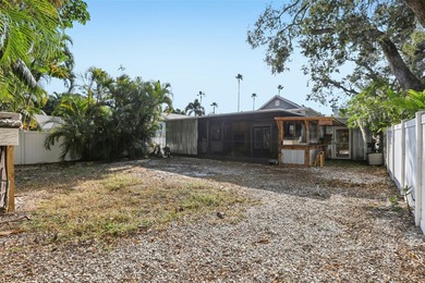 From the welcoming Key West-style front porch, step inside this on Belleair Country Club in Florida - for sale on GolfHomes.com, golf home, golf lot